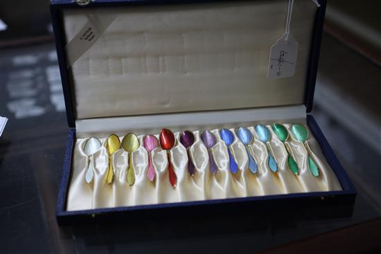 A cased set of twelve 20th century Norwegian sterling silver gilt and polychrome enamel coffee spoons by Hestenes, 3.75in.